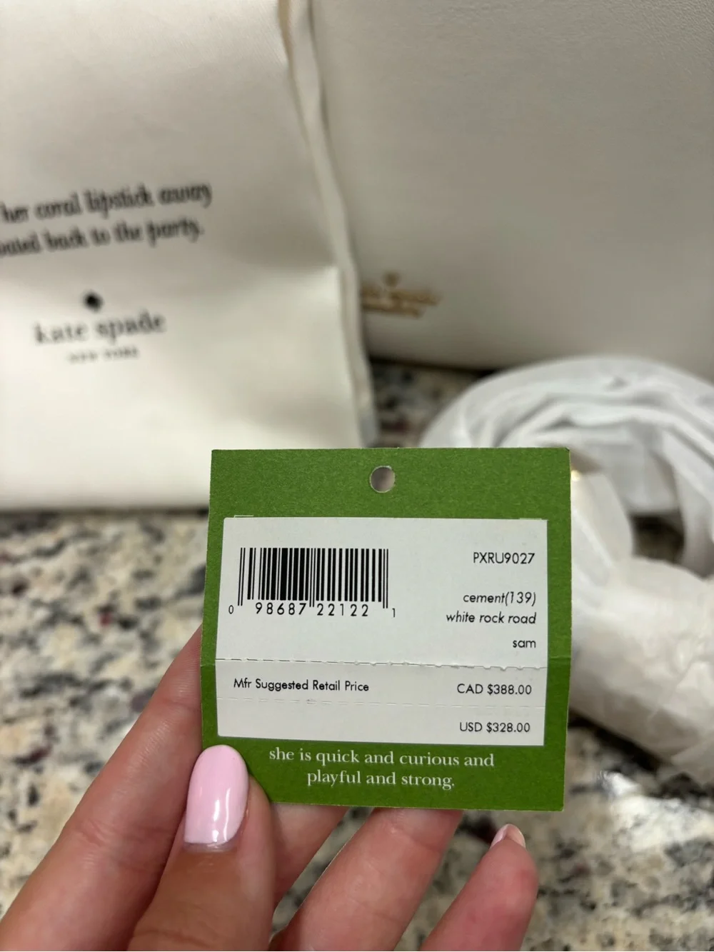 kate spade white leather bag with gold circular handle